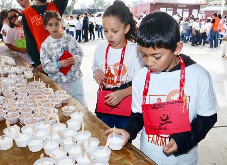 Island School students help themselves to ice cream.